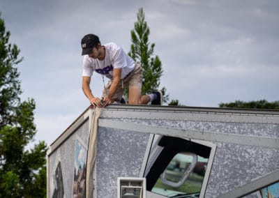 Man preping trailer for the day