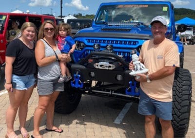 2021 Award winner family with blue metallic Jeep