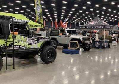Jeeps on display in the inside of the LeConte Convention Center